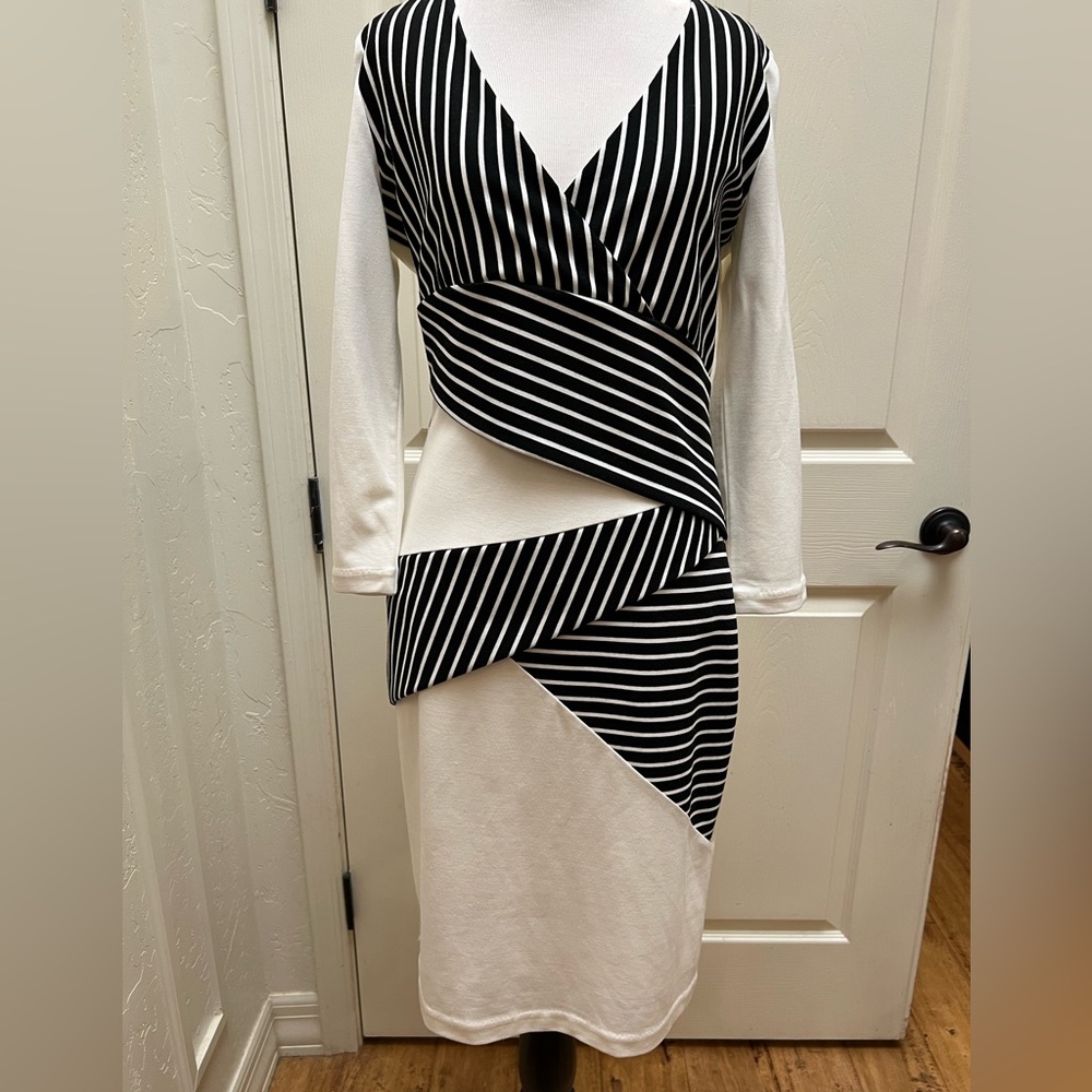 DS dress brand new black and white striped dress with tags on.
